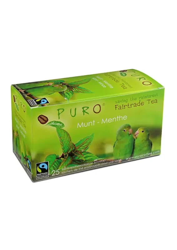 Eske med puro fairtrade myntete med et bilde av grønne papegøyer og en regnskogbakgrunn. inneholder 25 teposer.